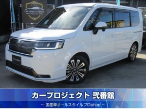 ステップワゴンスパーダ e:HEVスパーダプレミアムライン 純正9型ギャザーズナビ フルセグTV 純正10.1型フリップダウンモニター 両側自動ドア 電動テールゲート ハーフレザーシート シートヒーター CMBS 踏み間違い軽減システム 無限フロアマット&サイドバイザー 走行28400km